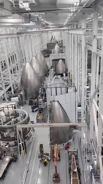Inside the Starfactory: rows of Starship nose cones