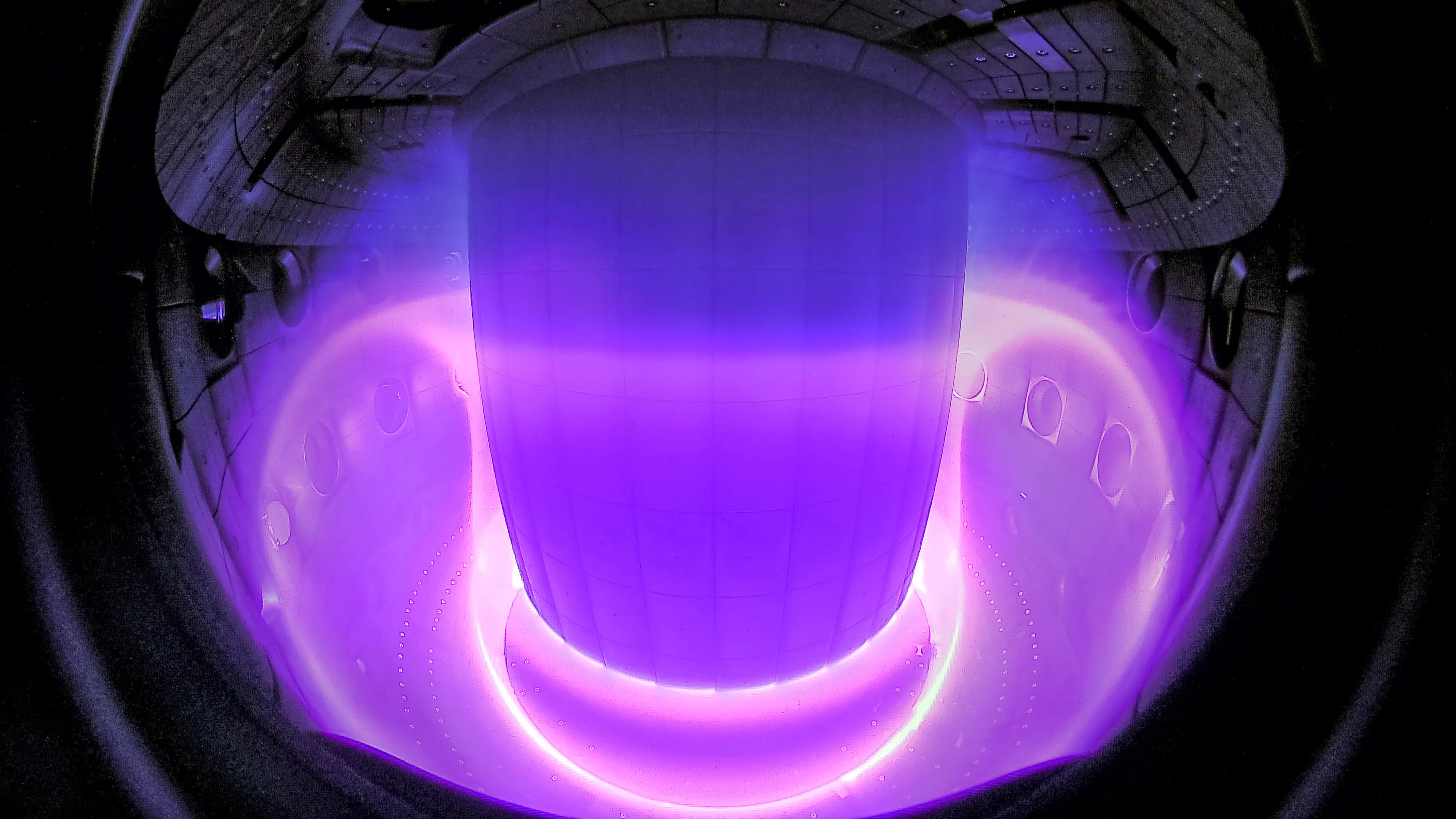 Purple plasma inside the TCV tokamak, visible-light camera
